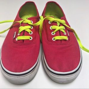 Bright pink Vans sneakers